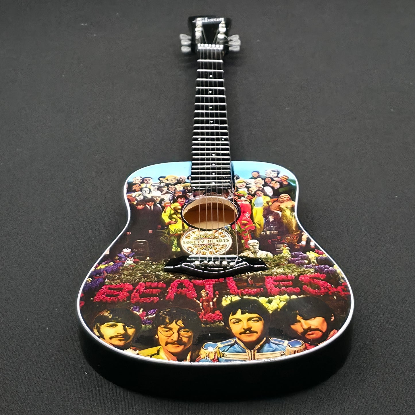 Miniature Guitar - The Beatles Sgt Peppers Acoustic - Model Guitar Inc Stand